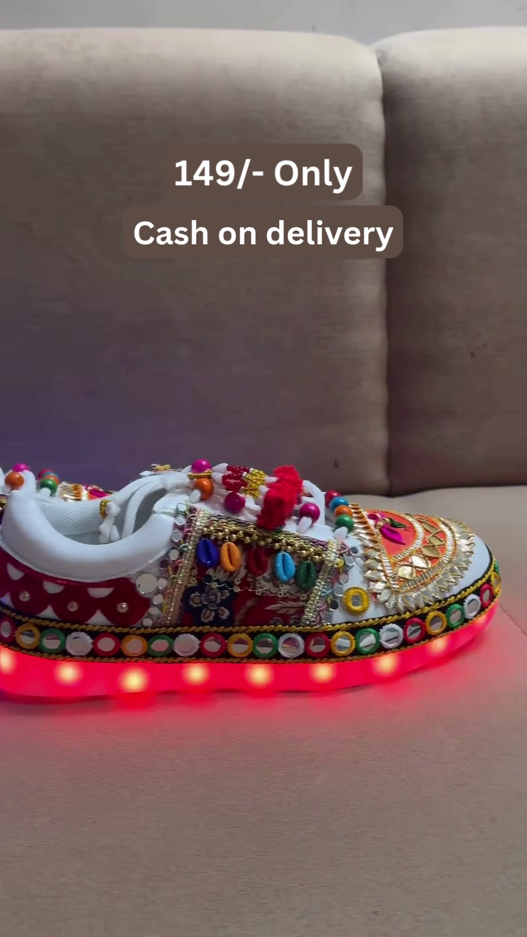 Unisex White Ethnic Mojari Footwear with Multicolor Bead Embroidery – Festive Pair with Red Light Showcase Styling