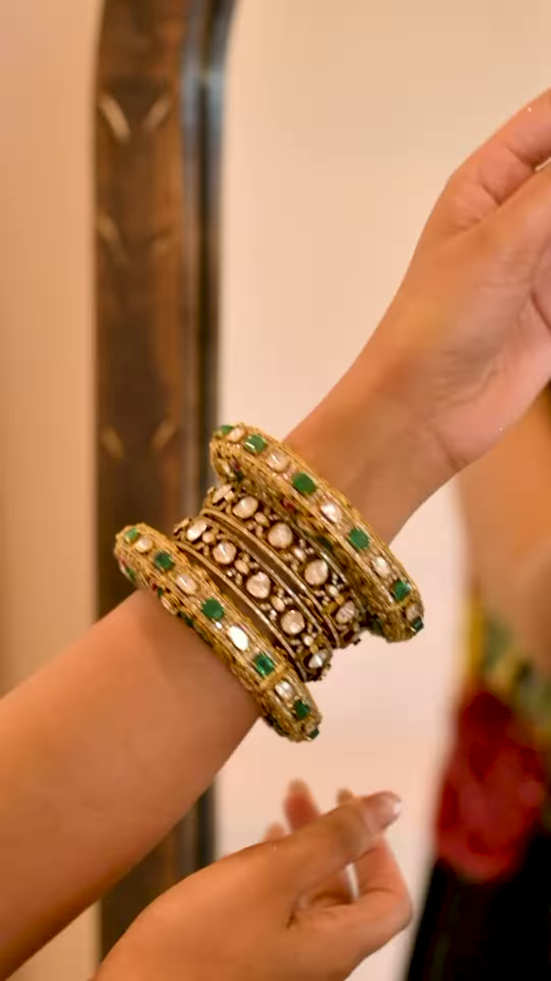 Women’s Black Saree with Gold Embellishments & Pleated Draping – Elegant Ethnicwear Styled with Traditional Bracelet