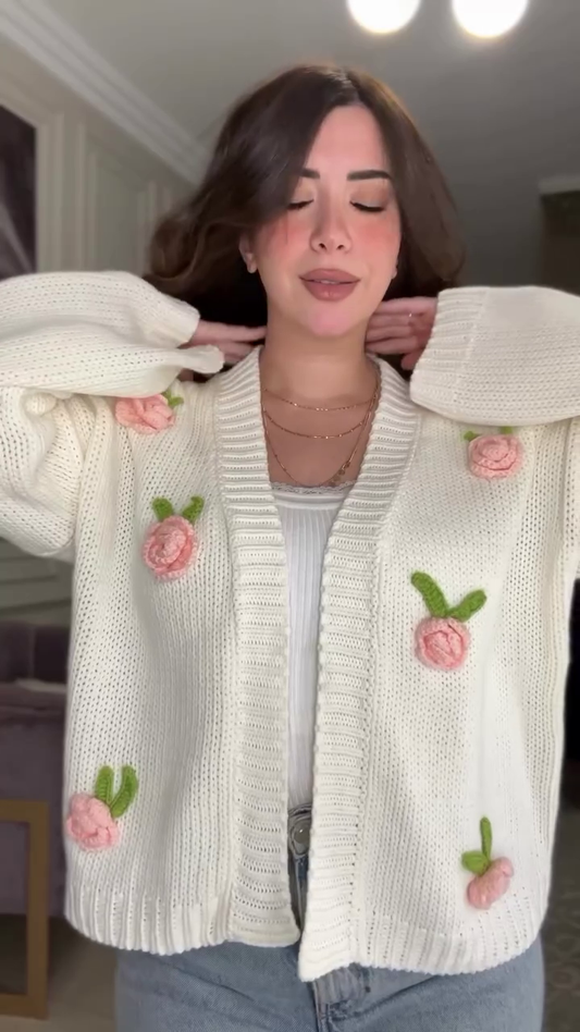 White Knit Cardigan with Pink Floral Appliqué 🌸🤍 – Button-Up Layer Styled with Gold Necklaces & Light Denim