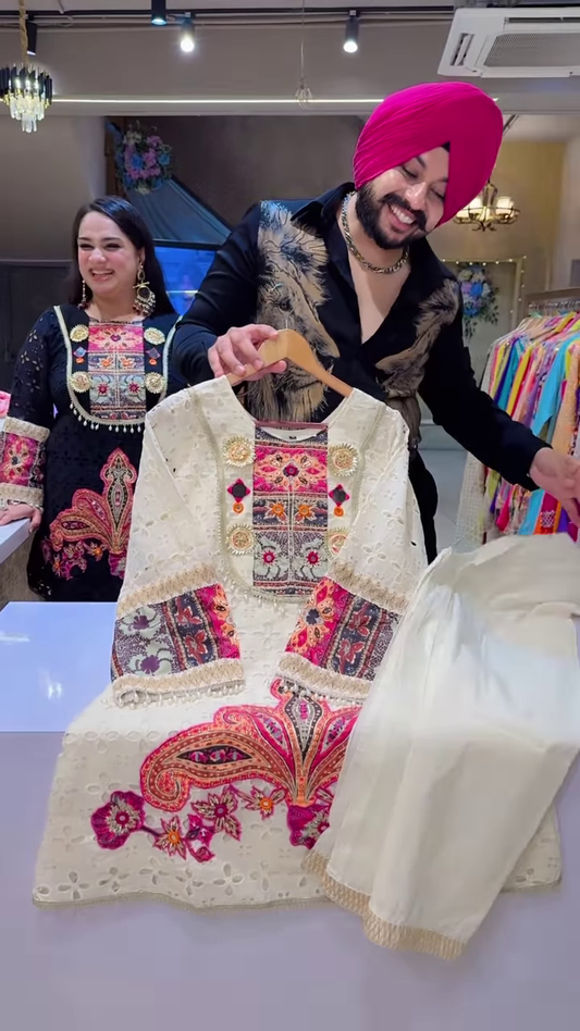 Black Embroidered Ethnic Dress with Multicolor Floral and Geometric Patterns, Tassel Accents