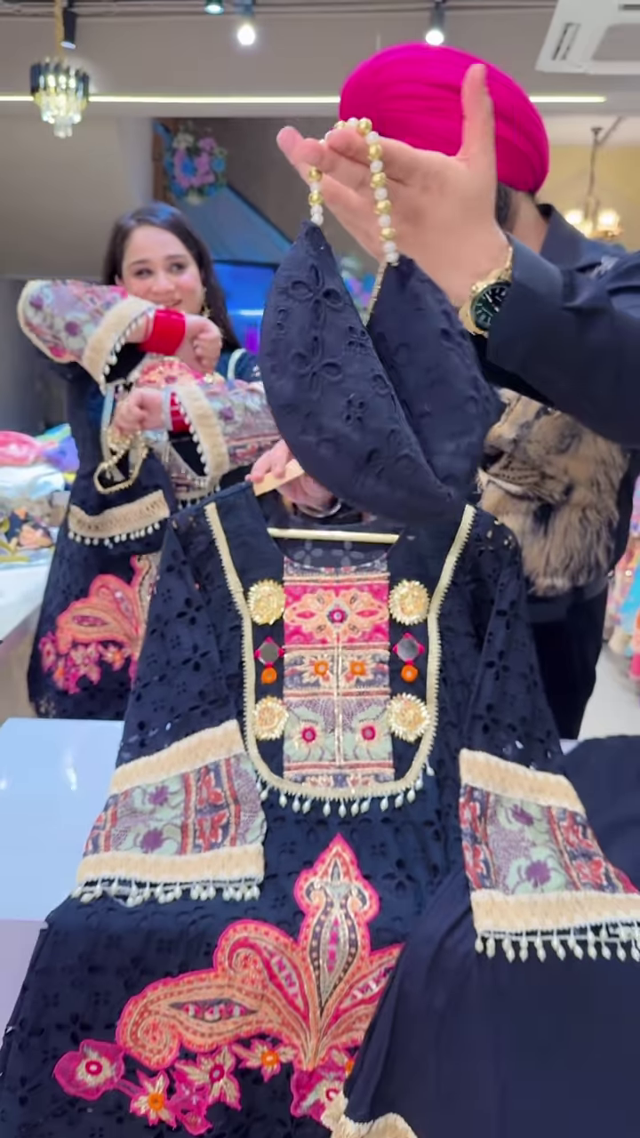 Black Embroidered Ethnic Dress with Multicolor Floral and Geometric Patterns, Tassel Accents