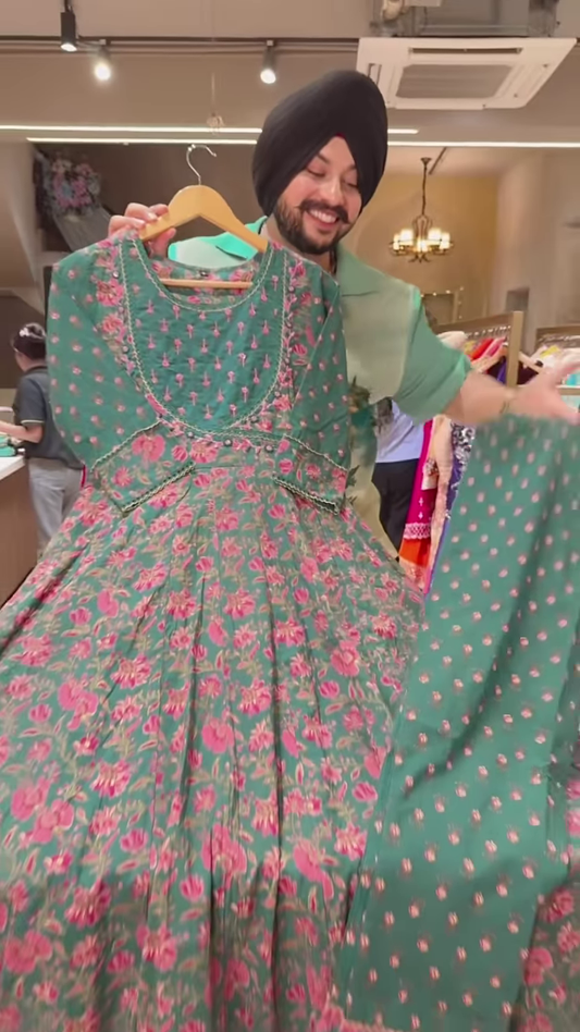 Green Floral Printed Ethnic Dress with Embroidered Neckline and Coordinated Fabric Panel