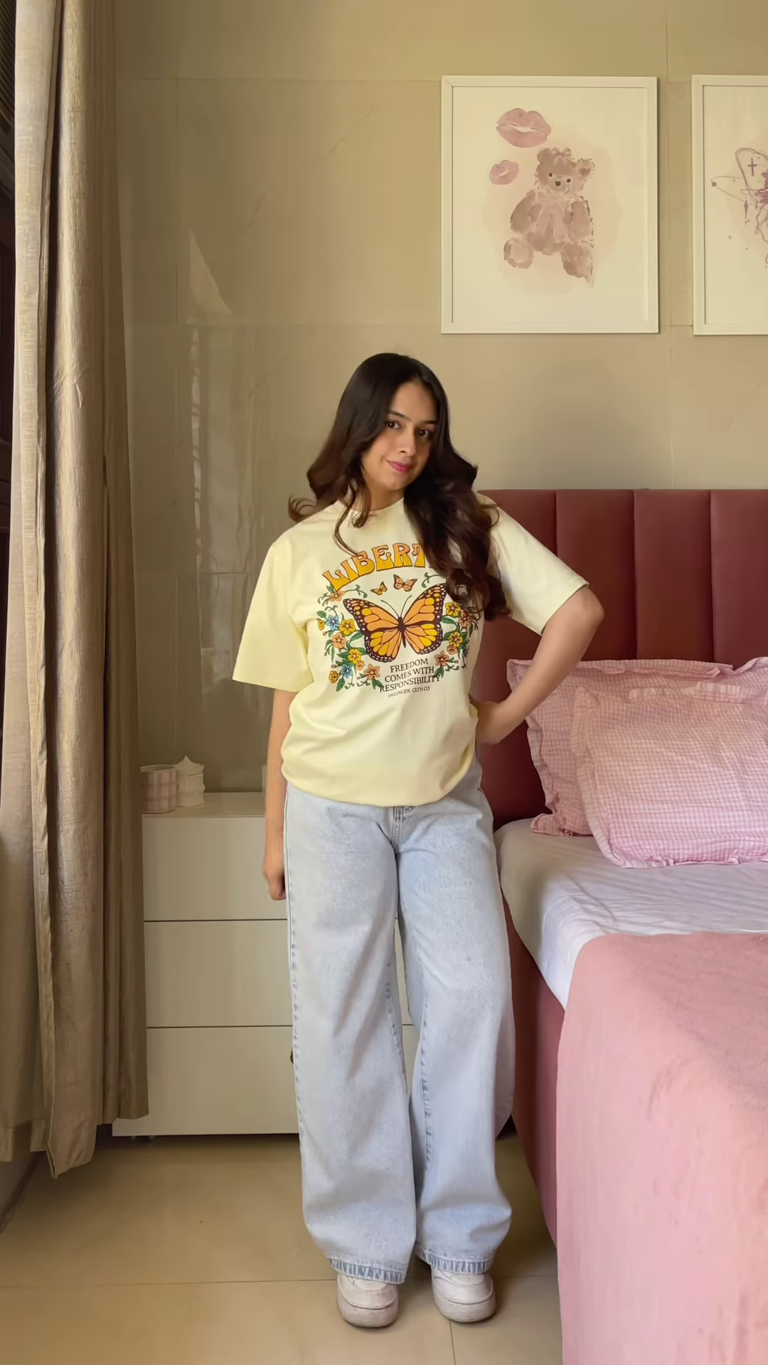 Pink Graphic T-Shirt with “Weekend Vibes” Print Paired with Light Blue Wide-Leg Jeans