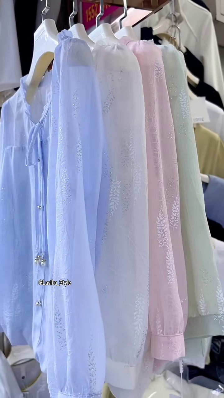 Light Blue Sheer Blouse with Leaf Pattern and Pearl Buttons