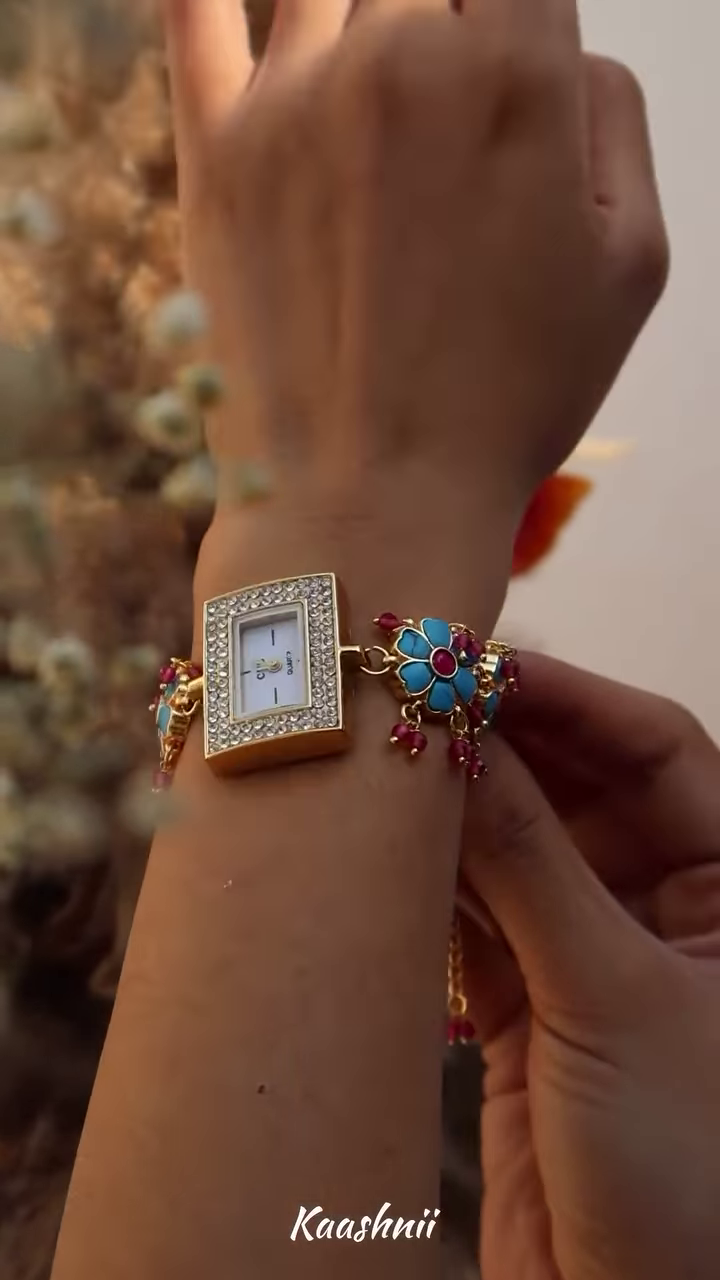 Whimsical Gold-Toned Wristwatch with Crescent Moon and Pearl Accents – Celestial Timepiece