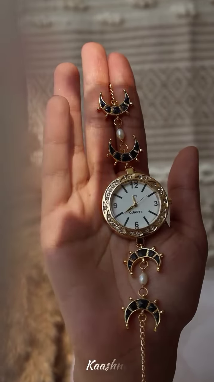 Whimsical Gold-Toned Wristwatch with Crescent Moon and Pearl Accents – Celestial Timepiece