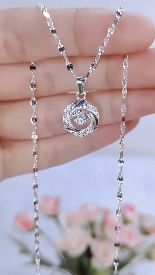 Elegant Silver Necklace with Twisted Floral Pendant – Sparkling Crystal Centerpiece