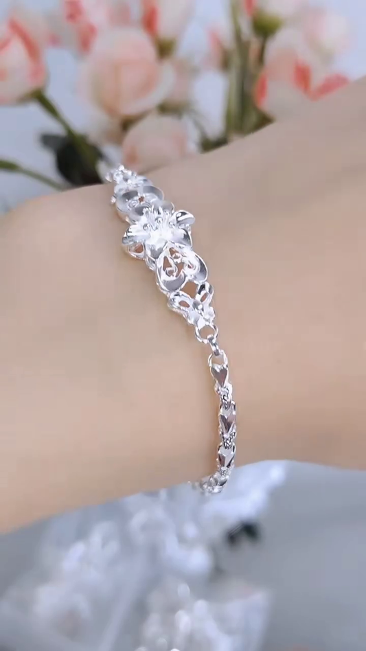 Elegant Sterling Silver Floral Link Bracelet with Intricate Openwork Design