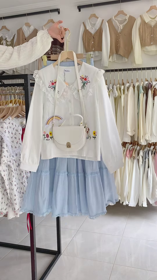 Charming Womenโs Embroidered Blouse and Layered Tulle Skirt Outfit with Crossbody Bag
