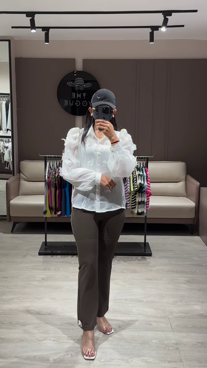 Elegant Sheer White Blouse with Ruffled Sleeves and Button-Down Front