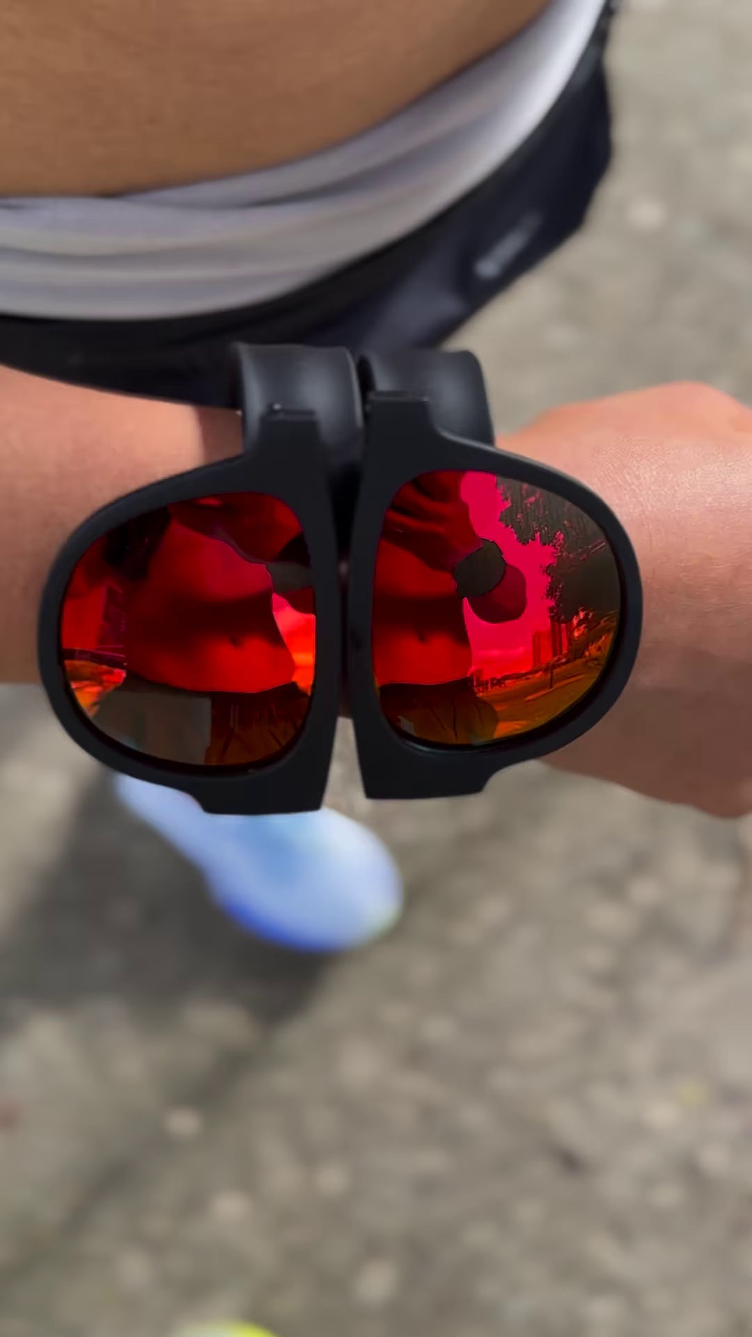 Foldable Sports Sunglasses with Mirrored Red Lenses and Secure Wrist Strap