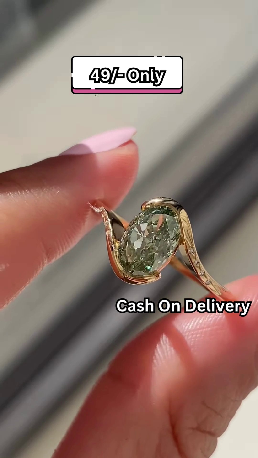 Elegant Gold-Toned Statement Ring with Oval Green Gemstone and Pave Accents