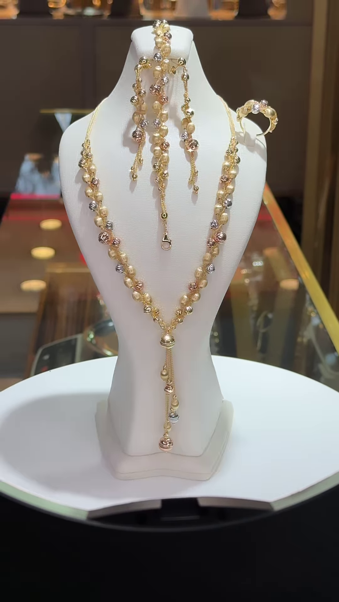 Elegant Multi-Tone Gold Bead Jewelry Set with Dangle Necklace, Earrings, and Ring