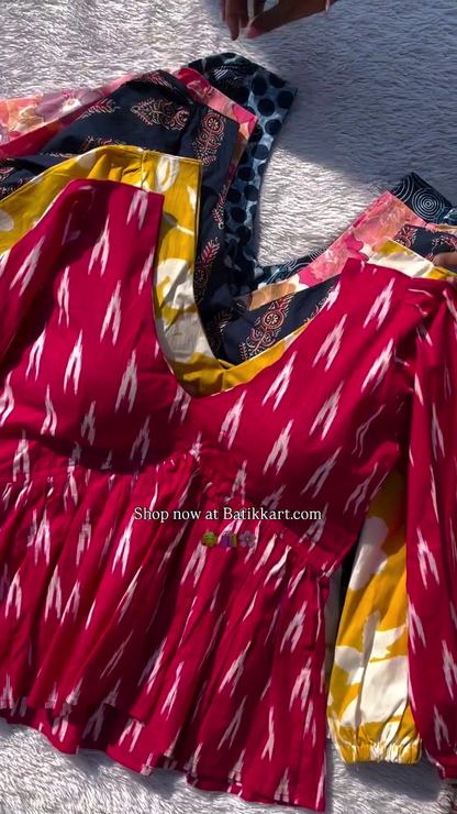 Vibrant Red and White Ikat Print Cotton Dress with Puff Sleeves and Flared Boho Silhouette