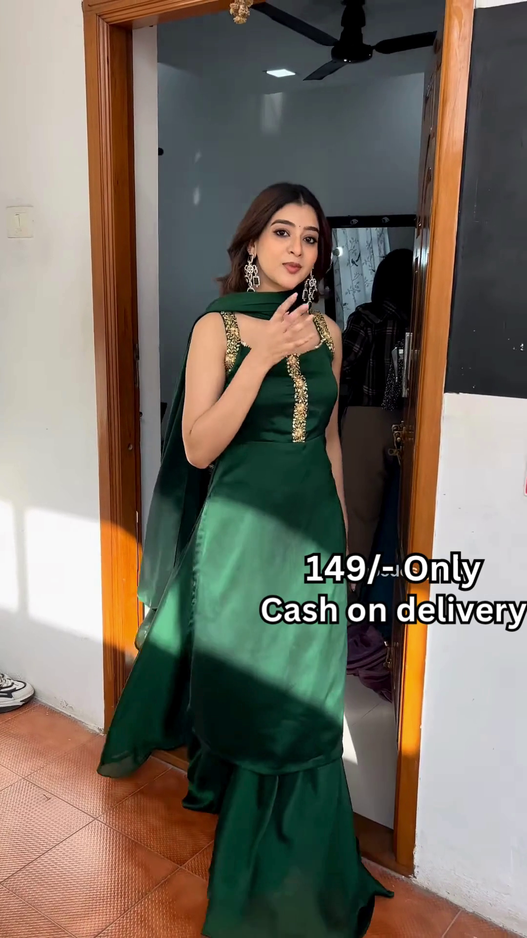 Women’s Red Embroidered Skirt Top Set with Traditional Earrings – Ethnic Doorway Portrait Ensemble