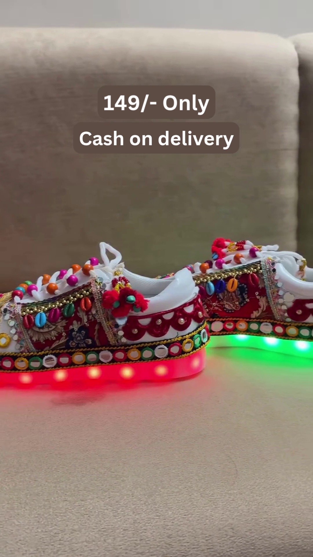 Unisex White Ethnic Mojari Footwear with Multicolor Bead Embroidery – Festive Pair with Red Light Showcase Styling