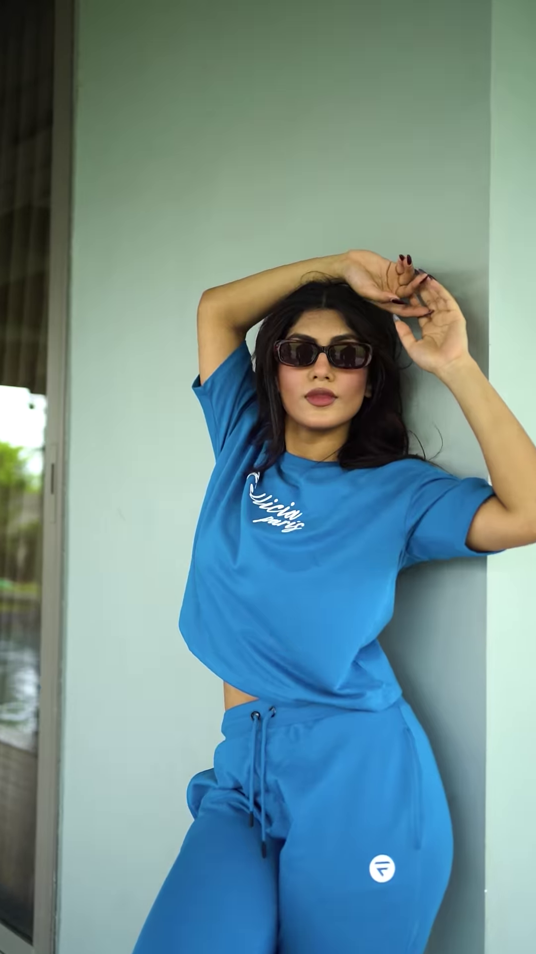 Unisex Bright Pink Tracksuit with Drawstring Joggers & Printed Sweatshirt – Casual Athleisure Set Styled with White Sneakers