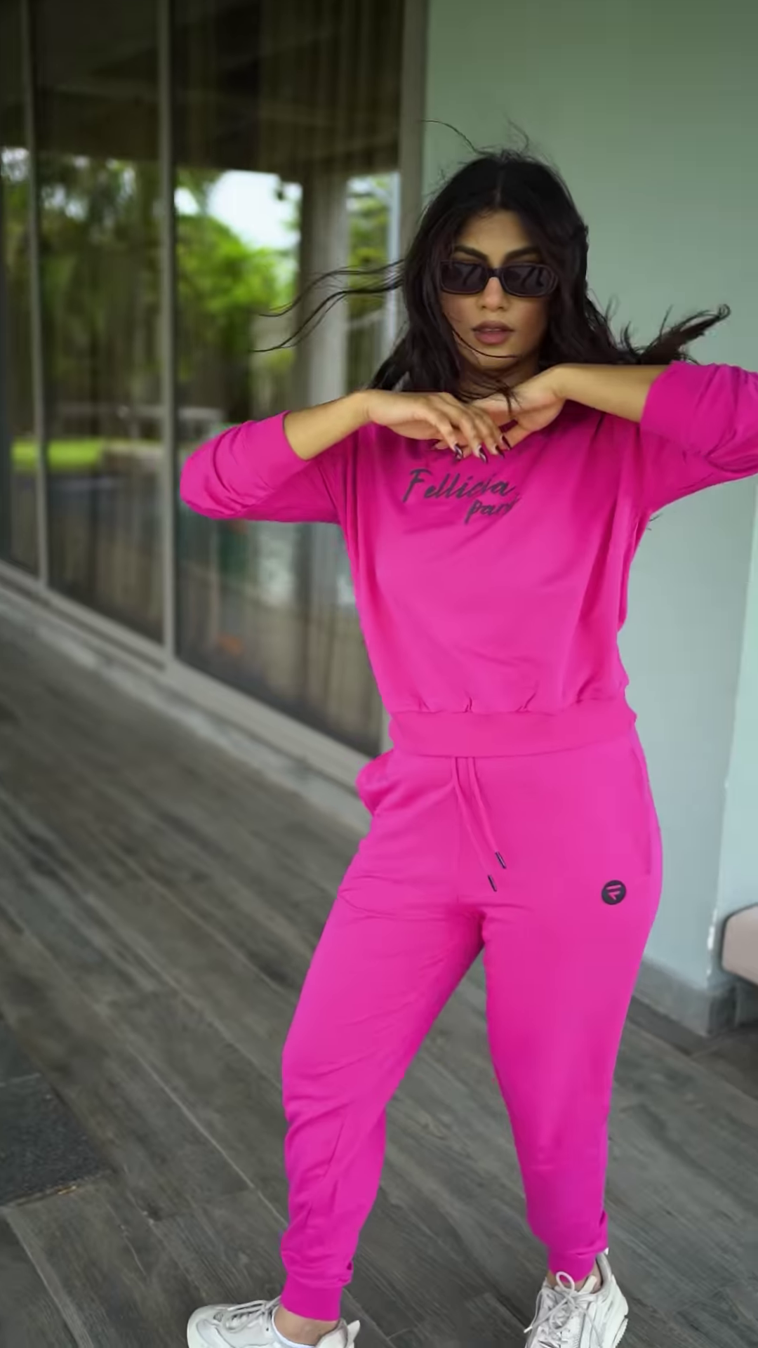 Unisex Bright Pink Tracksuit with Drawstring Joggers & Printed Sweatshirt – Casual Athleisure Set Styled with White Sneakers