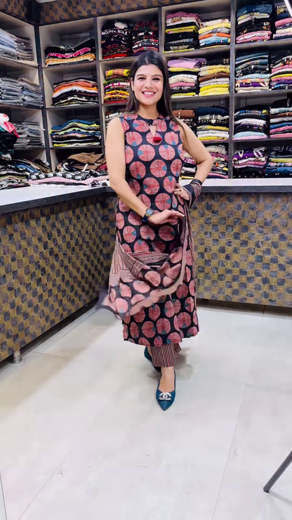 Women’s Sleeveless Black Dress with Red Circular Motifs & Keyhole Neckline – Boutique Ethnicwear Styled with Matching Fabric Accent