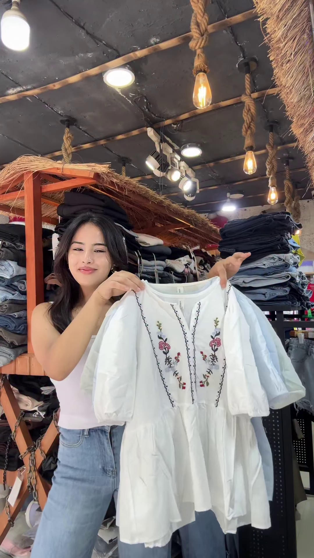 White Floral Embroidered Blouse with Light Blue Jeans – Casual Boutique Look for Women