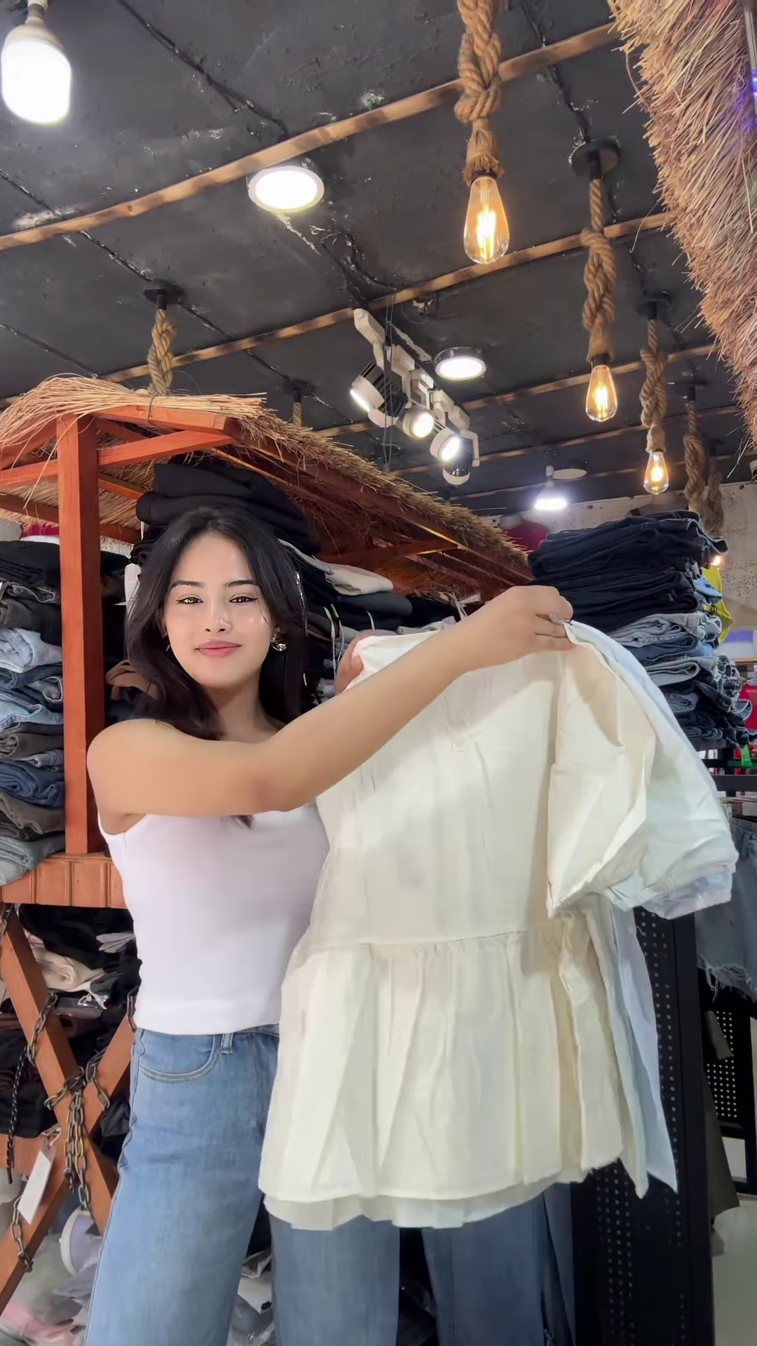 White Floral Embroidered Blouse with Light Blue Jeans – Casual Boutique Look for Women