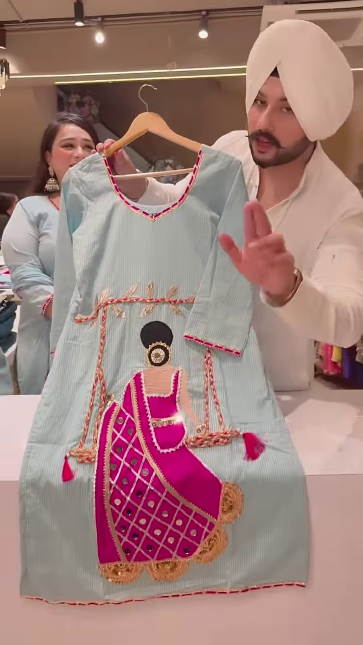 Light Blue Embroidered Kurta with Swing Motif – Artistic Ethnicwear for Women