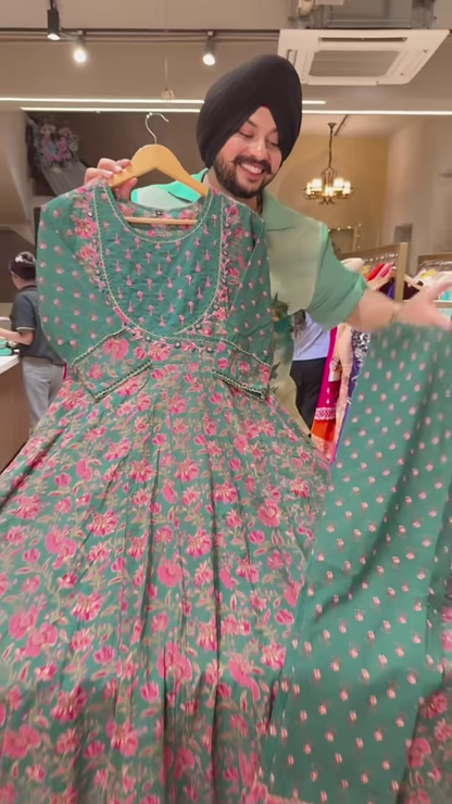 Green Floral Printed Ethnic Dress with Embroidered Neckline and Coordinated Fabric Panel