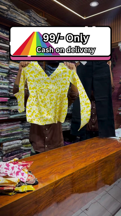 Yellow and White Floral Printed Top Paired with Black Straight-Fit Pants for Women