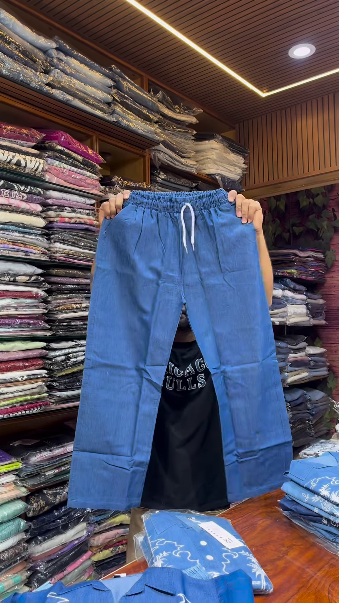 Light Blue Long-Sleeve Shirt with White Floral Embroidery and Button-Front Closure