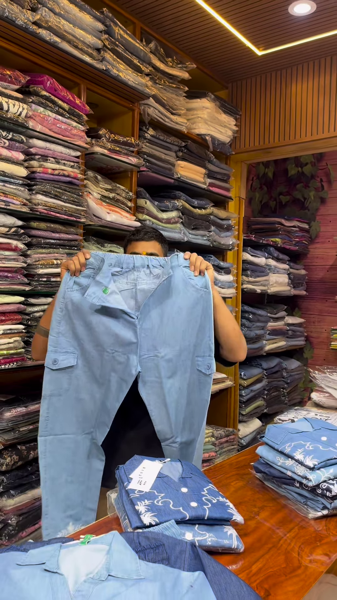 Light Blue Long-Sleeve Shirt with White Floral Embroidery and Button-Front Closure