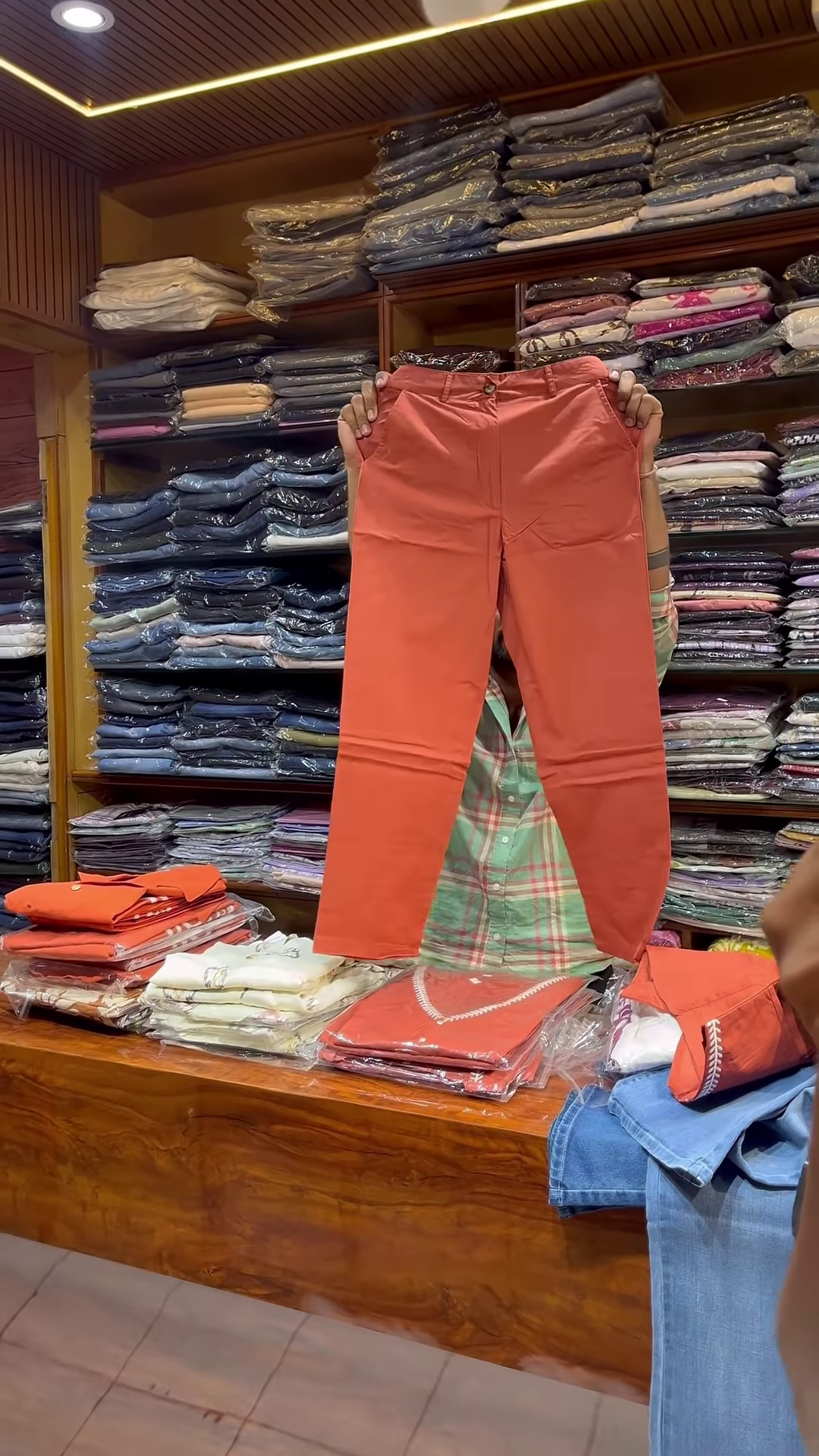 Orange Sleeveless V-Neck Vest with White Embroidered Edges and Button Closure