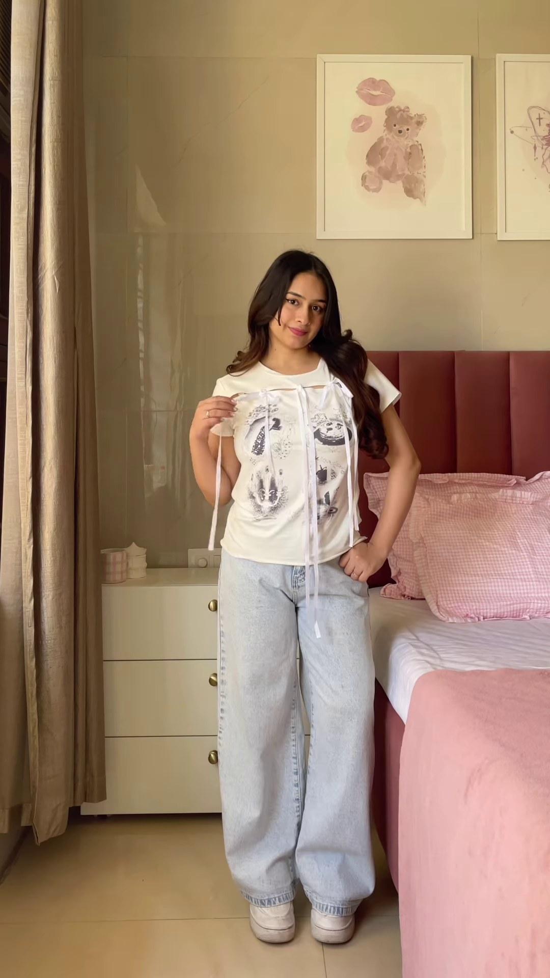 Pink Graphic T-Shirt with “Weekend Vibes” Print Paired with Light Blue Wide-Leg Jeans