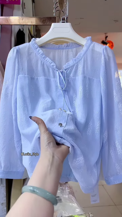 Light Blue Sheer Blouse with Leaf Pattern and Pearl Buttons