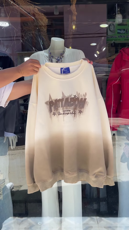 Stylish Pink Ombré Sweatshirt with Bold Graphic Print