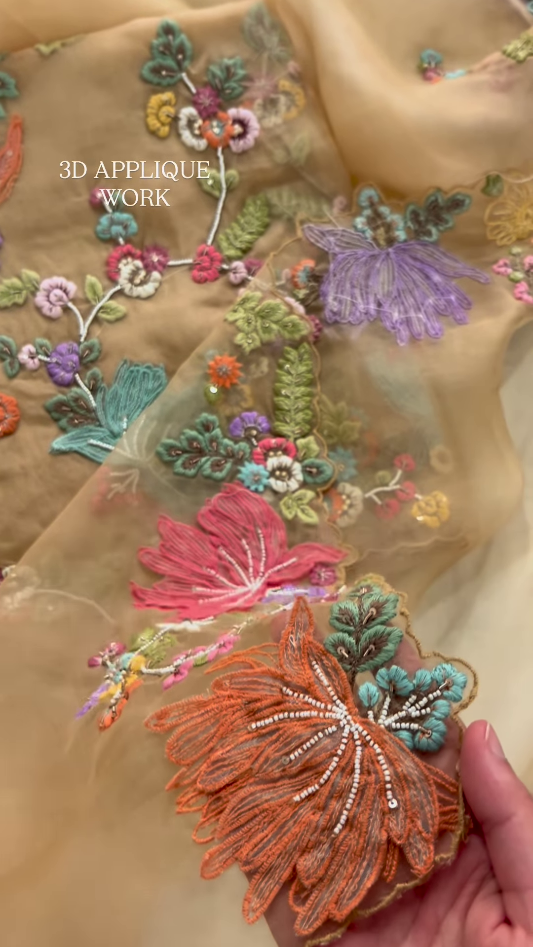 Luxurious Rose-Pink Fabric with Opulent Floral Embroidery