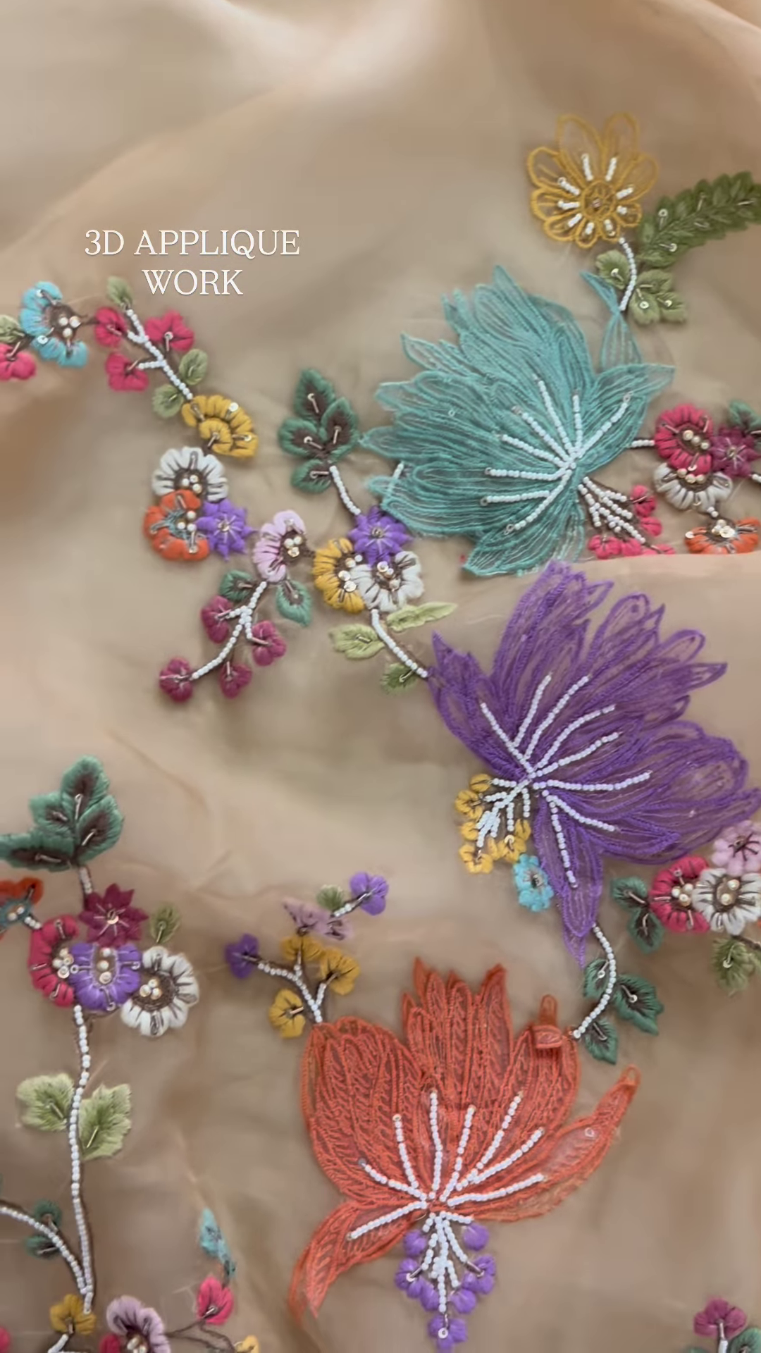 Luxurious Rose-Pink Fabric with Opulent Floral Embroidery