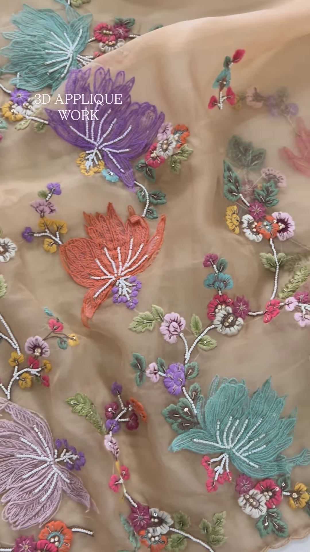 Luxurious Rose-Pink Fabric with Opulent Floral Embroidery