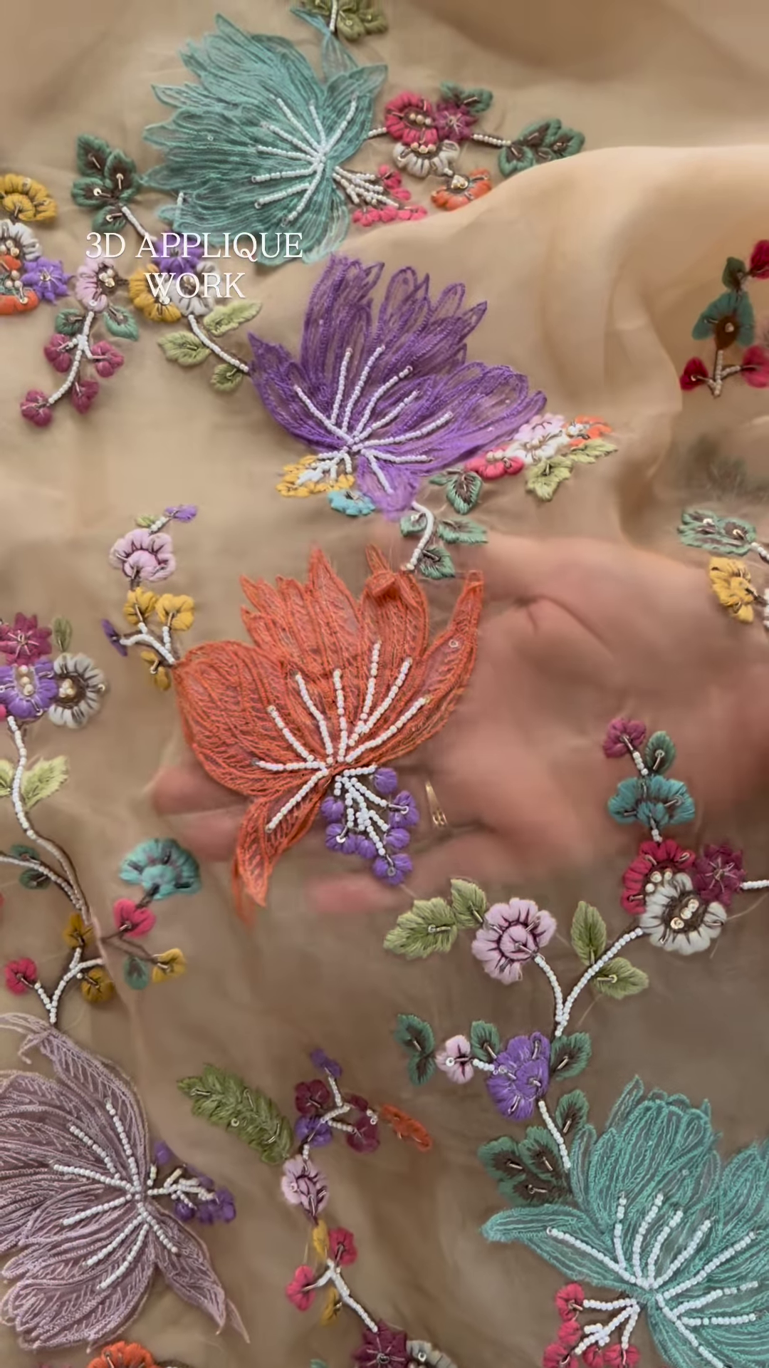 Luxurious Rose-Pink Fabric with Opulent Floral Embroidery