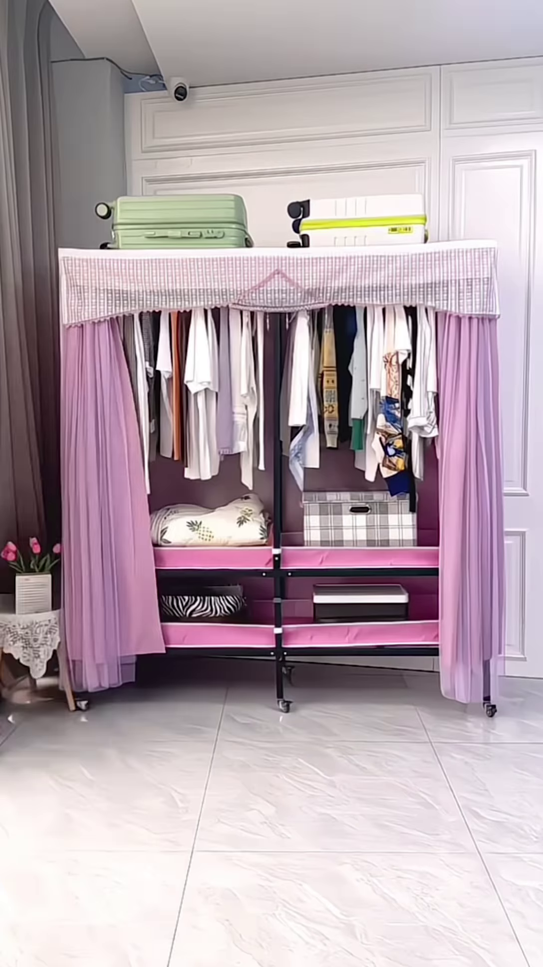 “Portable Fabric Wardrobe Organizer – Lightweight Rolling Clothes Storage with Lavender Curtains”