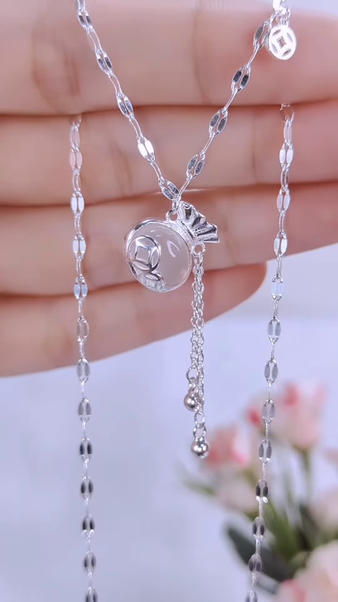 Necklace with Jade Coin Pendant and Tassel Detail – Lucky Charm Jewelry