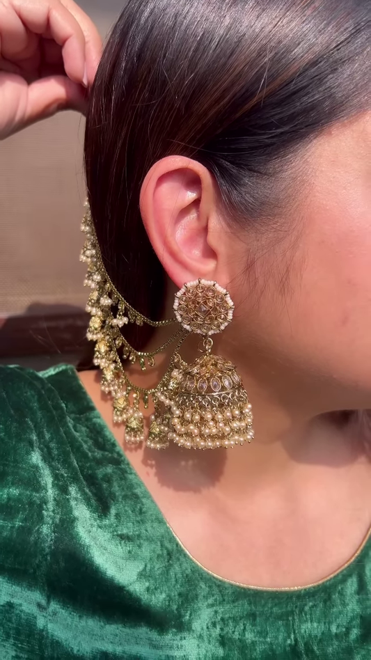 Ornate Gold-Toned Jhumka Earrings with Kundan and Multi-Chain Pearl Earchain