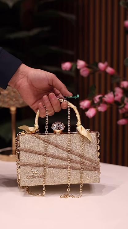 Elegant Ivory Clutch with Rhinestone Embellishments and Chain Strap