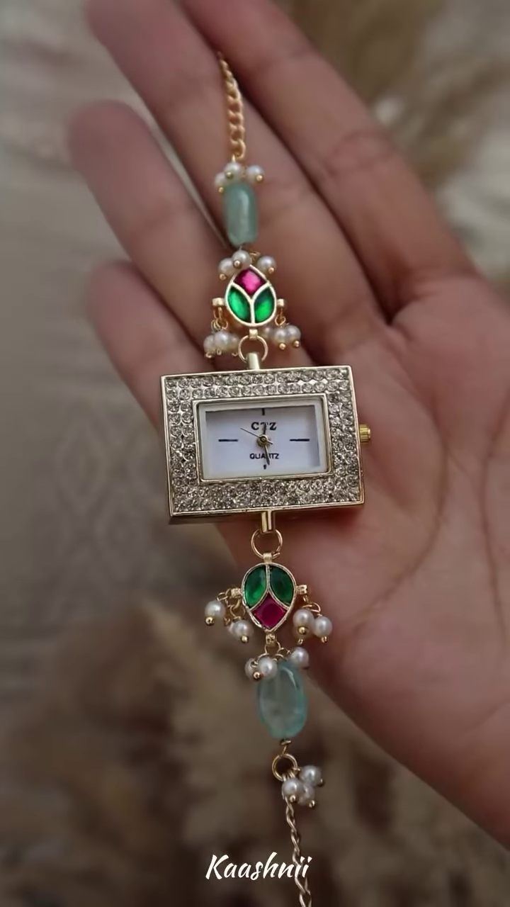 Whimsical Gold-Toned Wristwatch with Crescent Moon and Pearl Accents – Celestial Timepiece