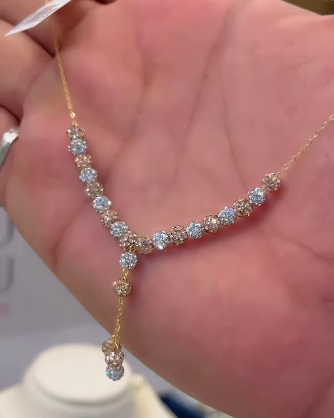 Elegant Two-Tone Gold Y-Necklace with Graduated Diamond Clusters