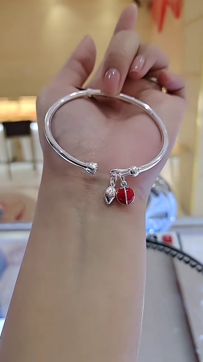Charming Silver-Toned Bangle Bracelet with Enamel Ladybug and Leaf Charms