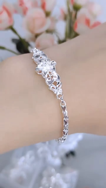 Elegant Sterling Silver Floral Link Bracelet with Intricate Openwork Design