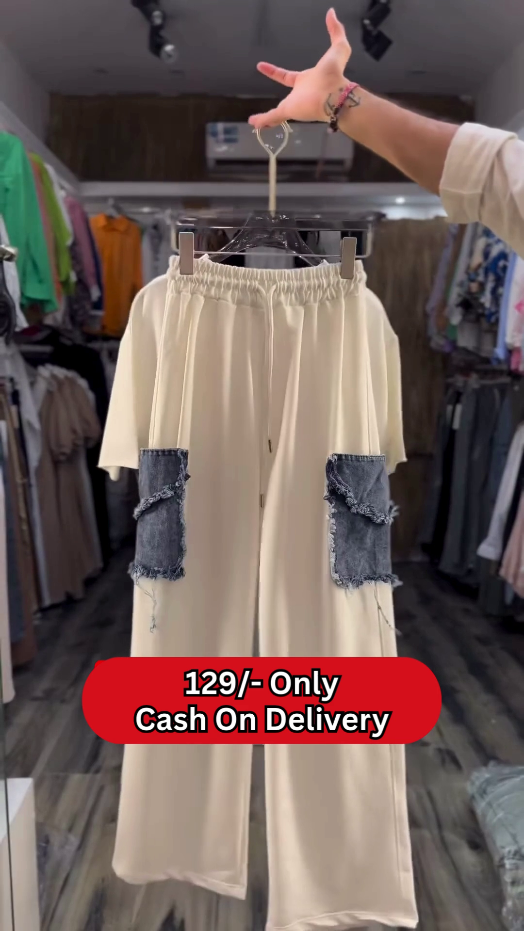 Trendy Women’s Cream Cropped T-Shirt and Wide-Leg Pants Set with Chain Detail