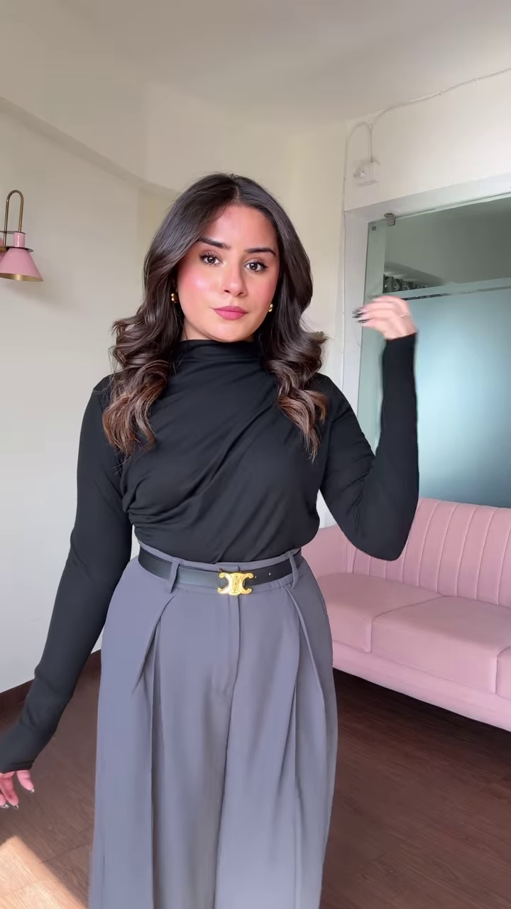 Chic Women's Outfit: Blue Mock Neck Long Sleeve Top and High-Waisted Black Wide-Leg Pants