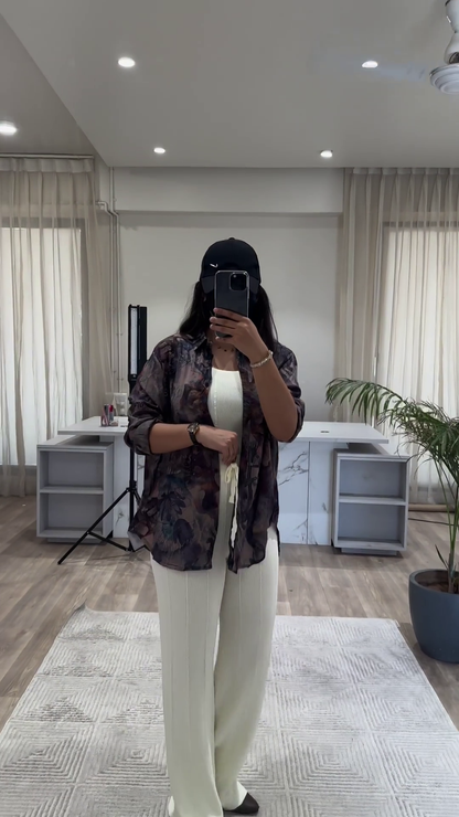 Bohemian Chic Outfit: Patterned Overshirt, Knit Top, and Wide-Leg Pants