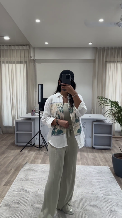 Bohemian Chic Outfit: Patterned Overshirt, Knit Top, and Wide-Leg Pants